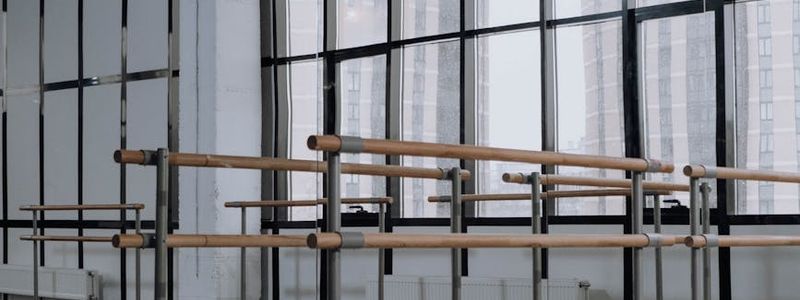 Wide shot of an empty, minimalist training space.